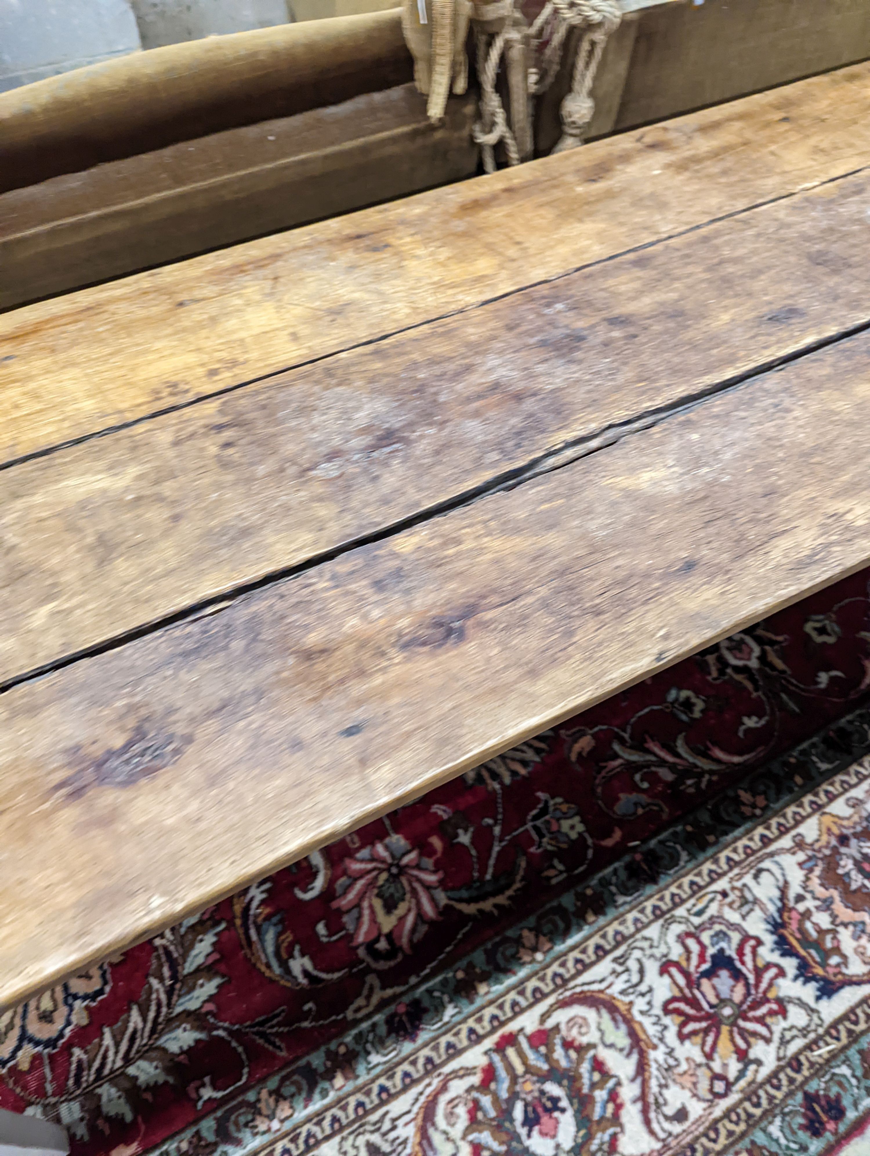A 19th century French rectangular part painted fruitwood kitchen table. Length -214cm, Depth- 62cm, Height-76cm.